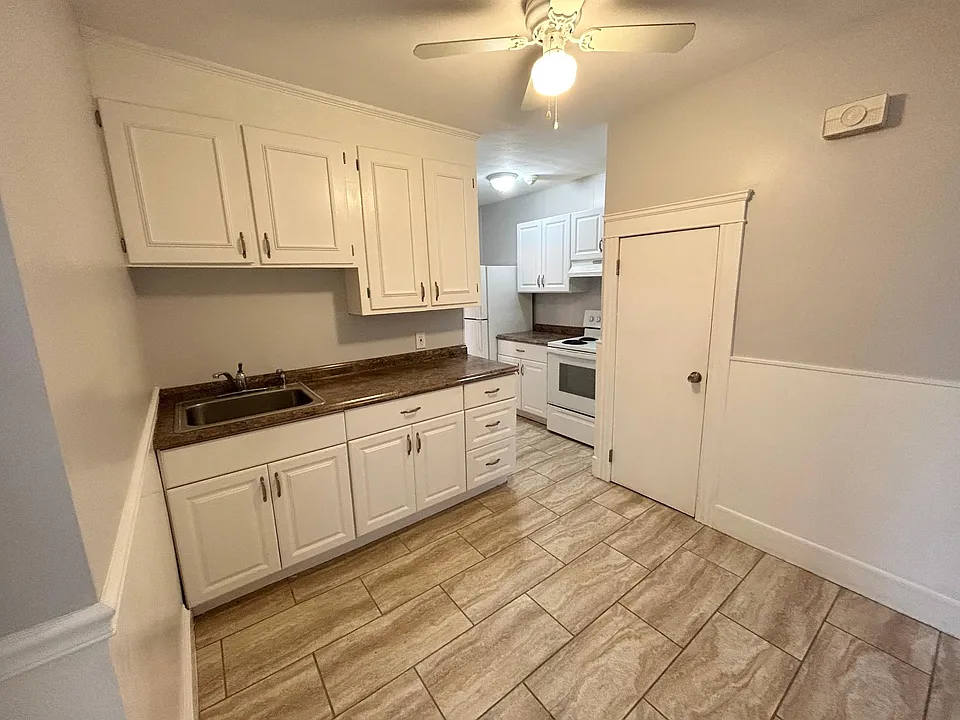 Kitchen fits a small table.