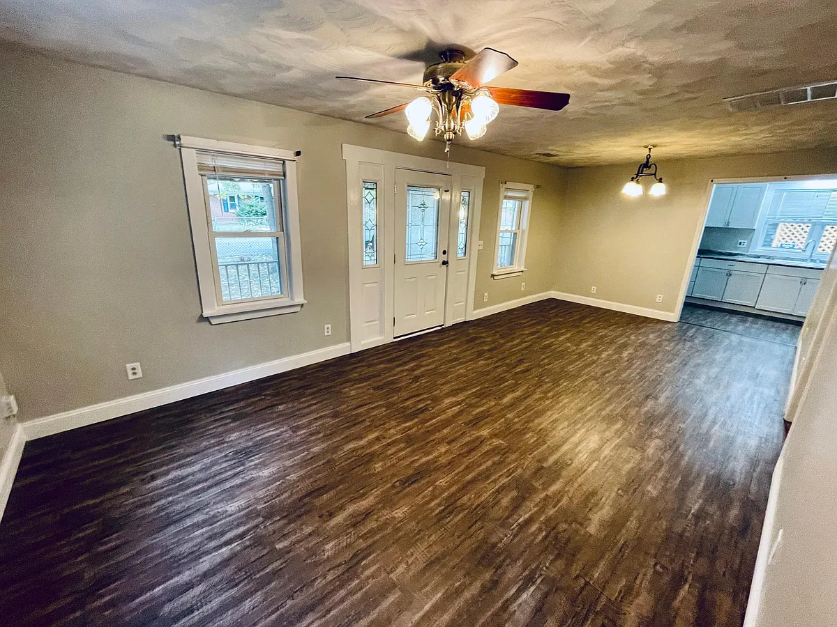 Spacious living and dining room area opens up to kitchen - 2121 Ridgeway Ave