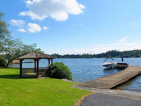 "Large Lot !  Enjoy this Beautiful Home with 116 ft +/- Waterfront,  Private Dock & Gazebo!"