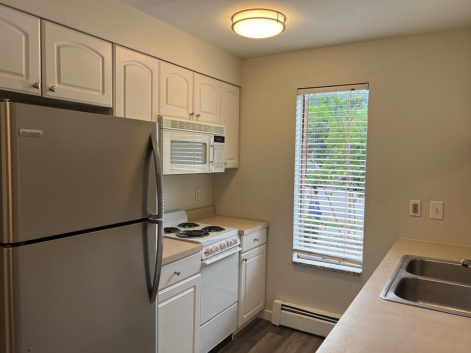 Welcome to Unit 104 - End Unit with a bonus window in the kitchen.