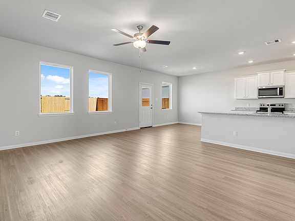 Enjoy family meals in this spacious dining room.