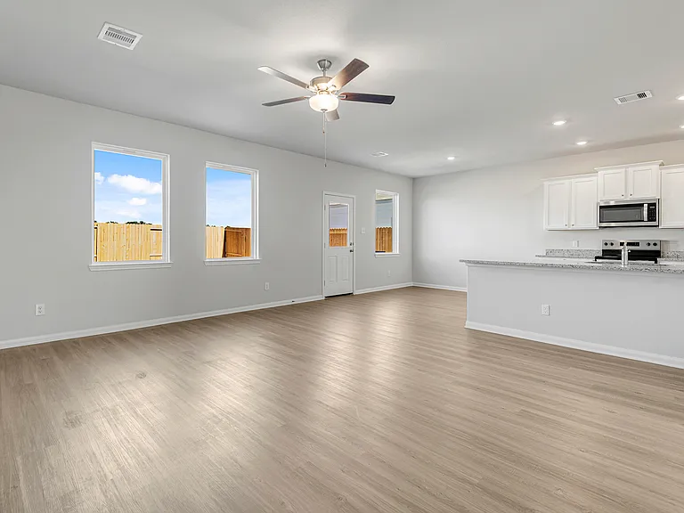 Spacious family room, kitchen and dining room.