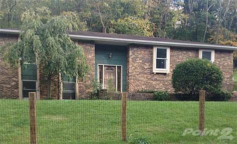 Home includes a 4th bedroom in lower level and the a spacious family room with fireplace.  Lots of storage!