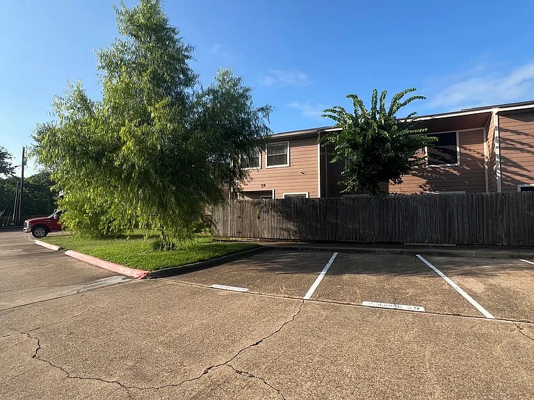 2 private parking spaces by back patio