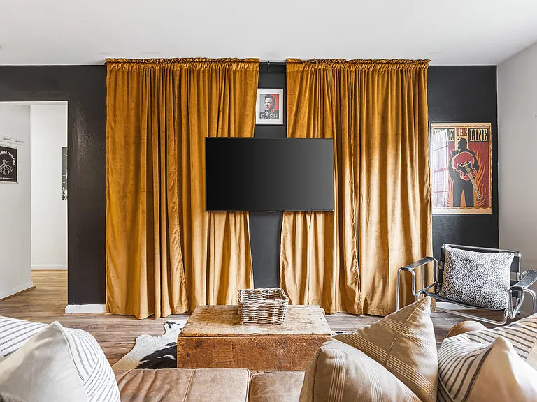 Cozy living room with a smart TV and a sleeper sofa. No stairs in this condo and located on the ground level, for easy access.