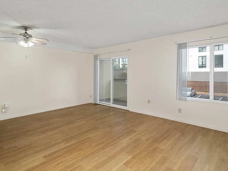 Living Room with Balcony and Hard Surface Flooring