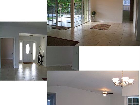 Vaulted Living Room overlooks the fenced back yard