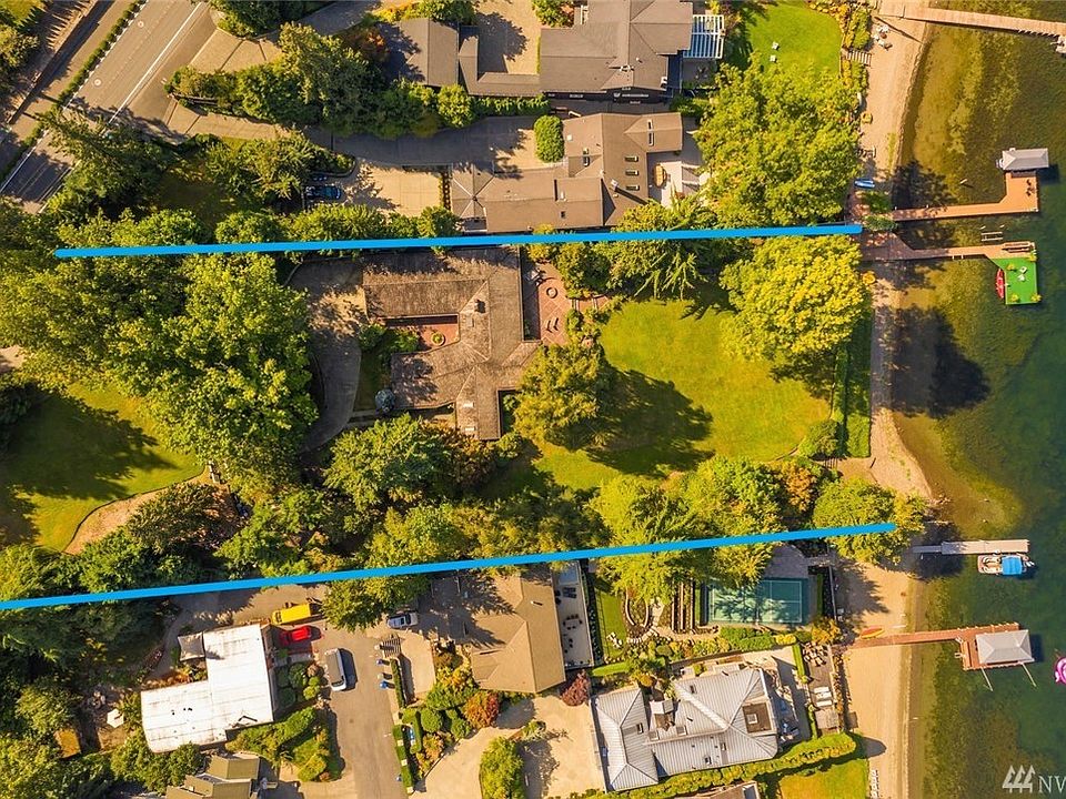 Blue lines show the appx property lines of the two lots combined.  The house is on the larger lot with the tree house occupying 