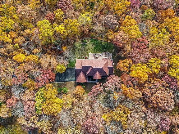 The home backs to the Young Conservation Area (1,145 acres) with beautiful views all 4 seasons and PRIVACY!