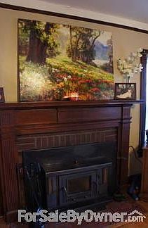 View from Living room toward the kitchen
						:
						The wood floors were recently refinished and restored to their original beauty.
