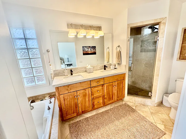 This is the newly renovated primary bedroom bathroom.