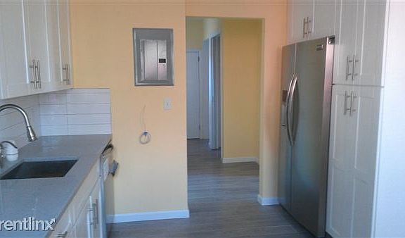 kitchen W/ Stainless steel Dishwasher & Frig