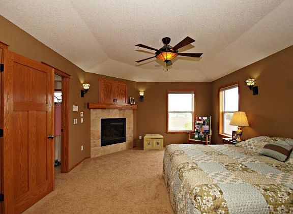 Master Bedroom With Gas Fireplace/Walk In Closet and Attached Master Bathroom