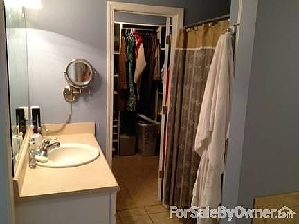 Master bath : walk-in shower, large walk-in closet, linen closet, large separate bathtub.