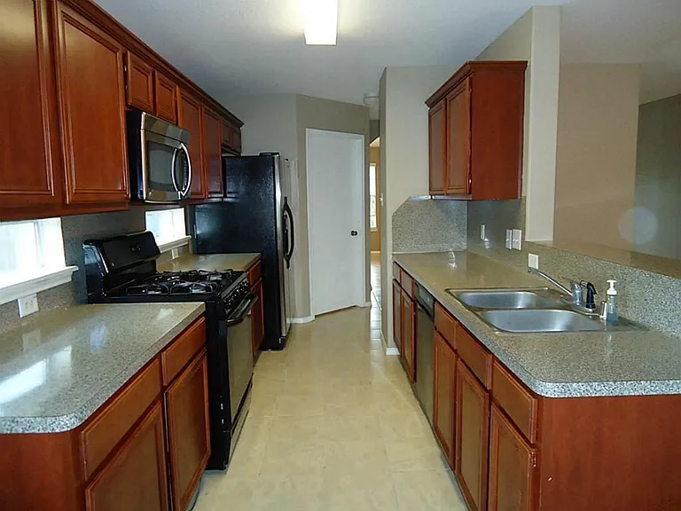 11047 Knobbley Oak Ct — Photo 21