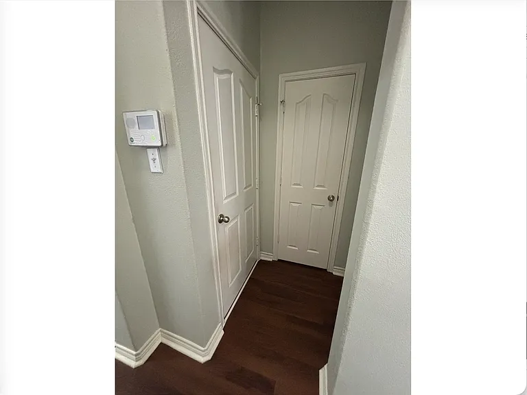 Entry from garage with storage closet