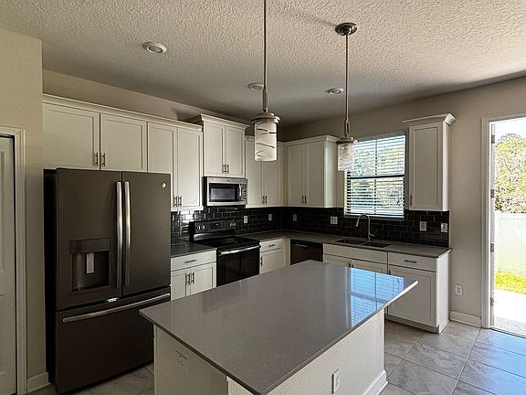 3rd image of 11228 Whistling Pine Way #1