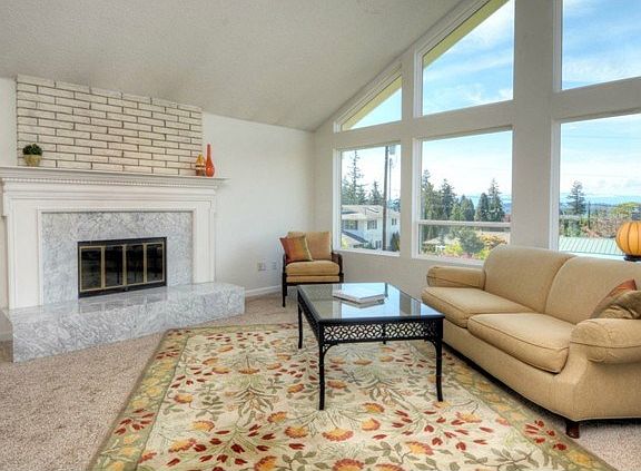 Marble surround on the wood burning fireplace, there is gas in t