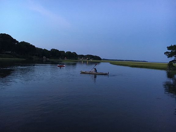 Kayaking at dusk.