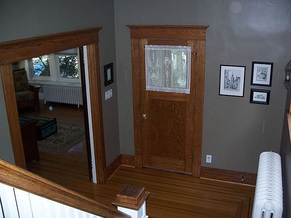 Refinished quartered oak entryway with double french doors