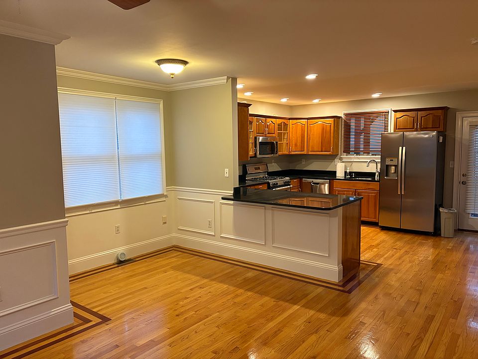 Dining area nook, breakfast bar, and kitchen