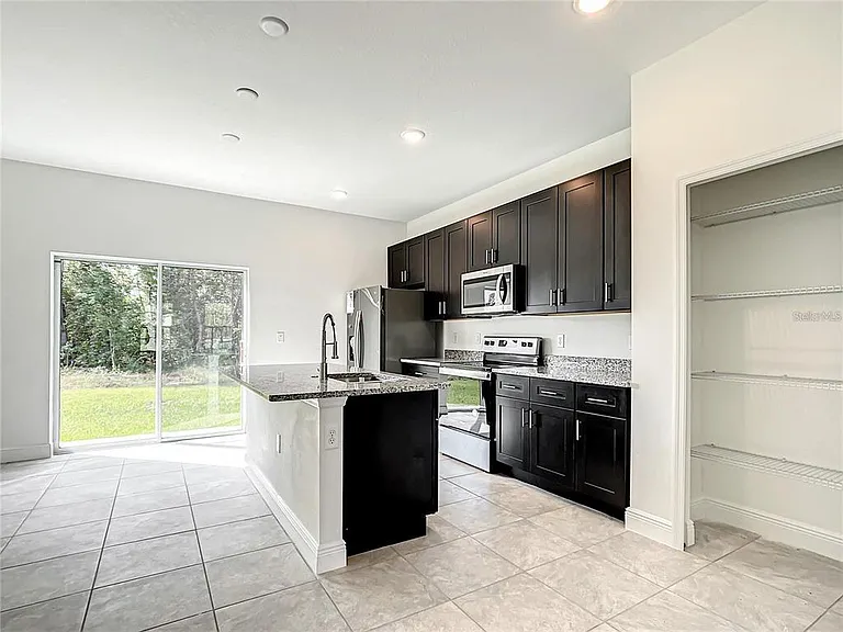 406 Marion Oaks Trl — Photo 19