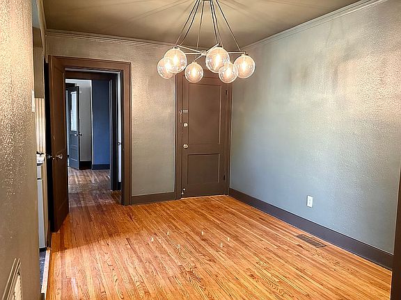 Moody green dining room