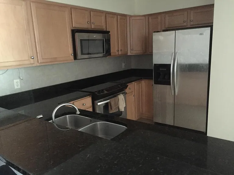 Updated Kitchen. Granite. Stainless. Under Cabinet Lighting. *The Fridge is clean now HA*