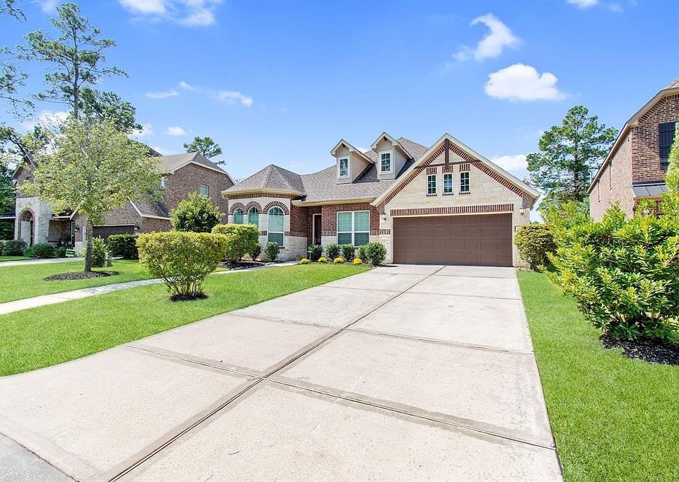 Beautiful curb appeal and a long double wide driveway lead to this impressive 5 bedroom, single story home in Sawmill Ranch!