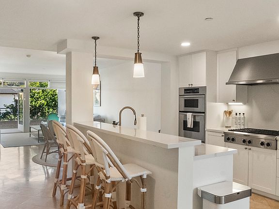 Kitchen Island - new countertops, lighting, sink, faucet and paint.