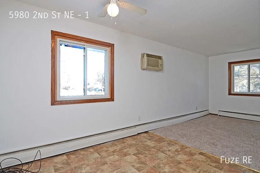 Building Photo - 5980 2nd St NE #1