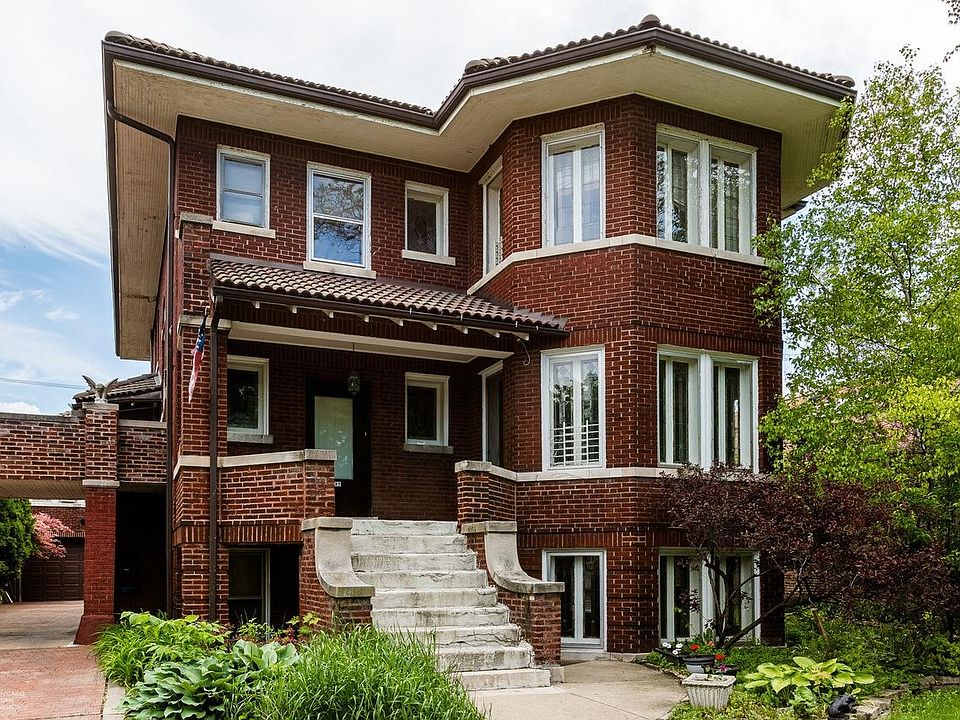The coach house unit is located at the end of the driveway above the garage.