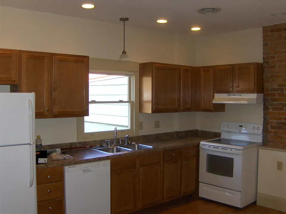 Kitchen and main room, with modern recessed and dimmer lighting