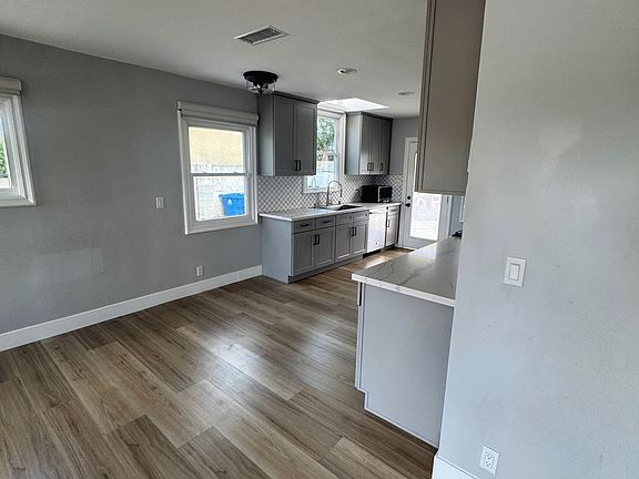 Dining area leading into the living room