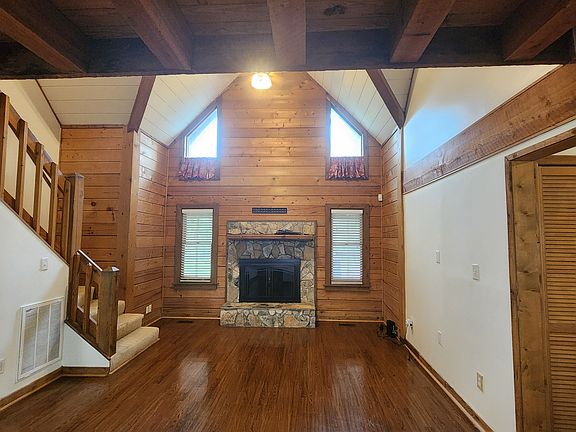 living room with vaulted ceiling