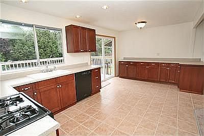 Large kitchen with eating area.