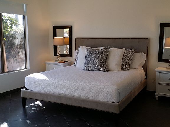Master bedroom with 55"HDTV and leather couch for reading. T