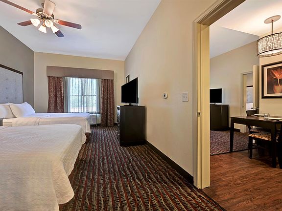 Two Bedroom, Two Bath - one king bed, two double queen beds, sleeper sofa. Fully furnished.