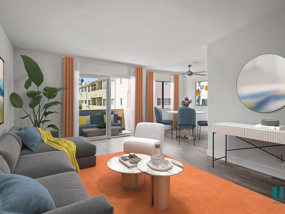 Open-Concept Living and Dining Room with Patio