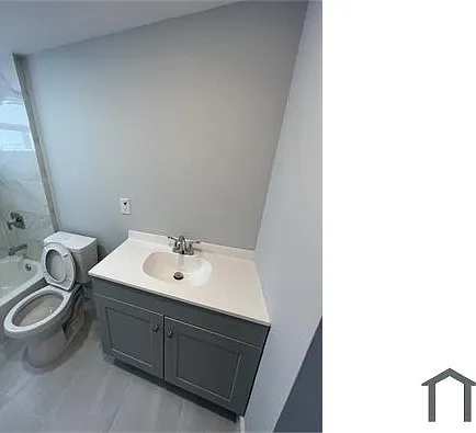 981 W 37th St — Photo 12