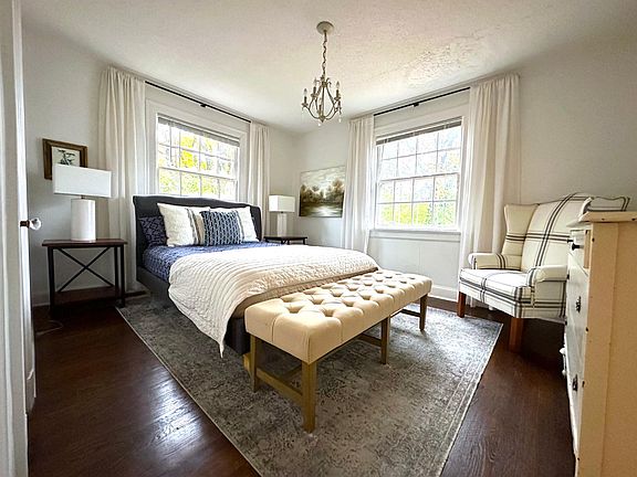 First floor bedroom, white paint, hardwood floors, closet. Large enough for a king size bed.