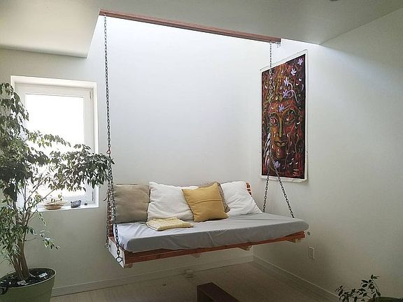 Hanging day bed under