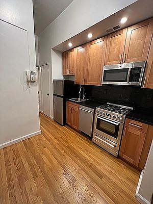 4th image of 235 E 12th St APT 1C