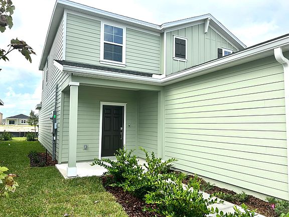 LEFT SIDE OF HOME & FRONT ENTRY