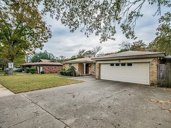 Roomy Two Car Garage and One Covered Carport