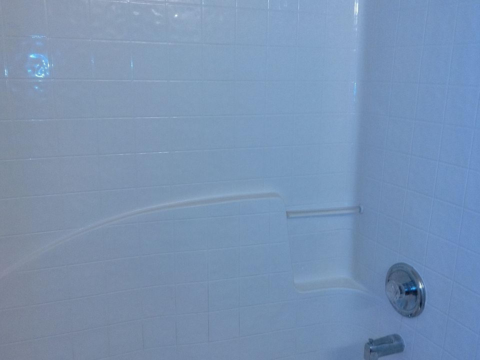 Shower bathtub combo in upstairs Hallway.