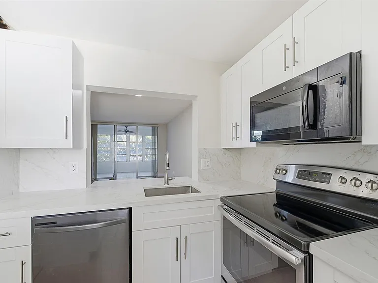 9430 Poinciana Pl #409 — Photo 1