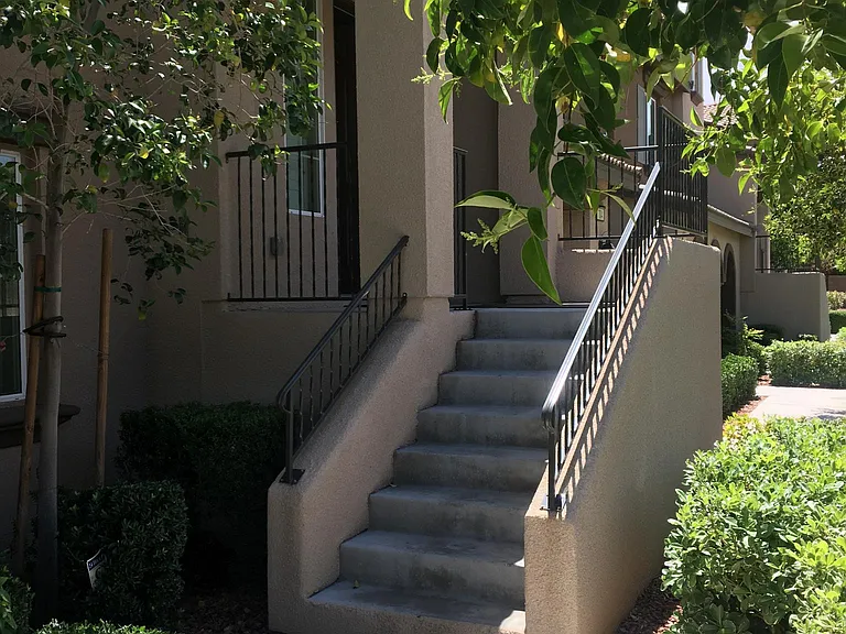 Front entry way to townhome to small porch