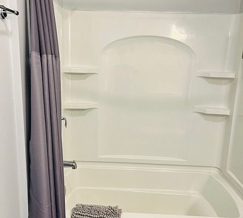 Full-sized tub and shower and