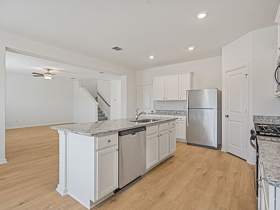 The spacious kitchen is perfect for preparing your family s favorite meals and treats.